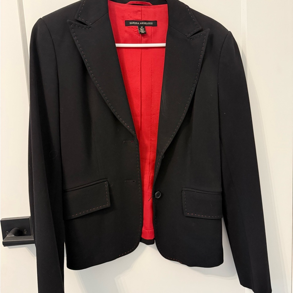 Sophisticated Black Blazer with Red Lining